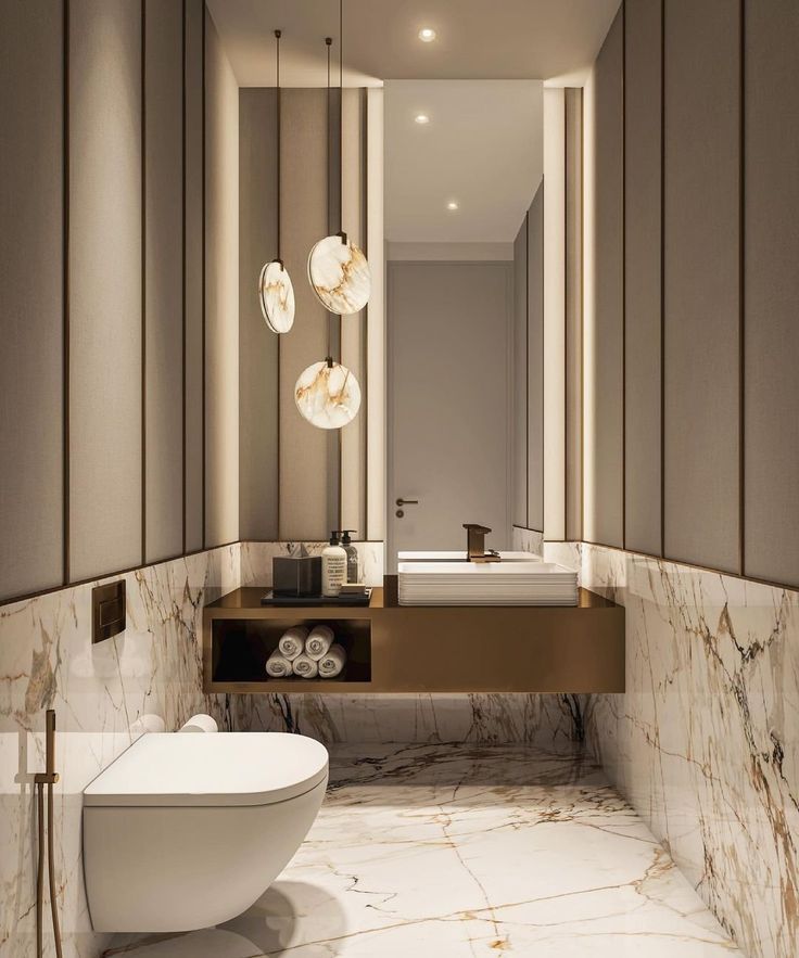 a modern bathroom with marble floors and walls