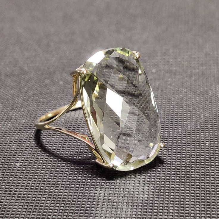 You can choose your own gem in my store. Let me know if you would like to see options Details of the ring Gem: Green Amethyst Gem size & shape: 20x12 mm and Cushion Center Gem weight: 9.70 carat Gold purity: 14K (58.33% approx.) Gold weight: 1.48 grams total weight of ring: 3.42 grams Fine briolette cut Green Amethyst cushion shape gemstone ring set in solid 14K yellow gold. The Gold purity is guaranteed and it comes with authentic 14 kt gold hallmark. Since these Rings are handmade, Size Cu Faceted Gemstones In 14k Gold For Formal Occasions, Formal Faceted Emerald Ring, Gold Rings With Green Amethyst For Formal Events, Gold Rings With Green Amethyst For Formal Occasions, Formal Gold Rings With Green Amethyst, Formal Gold Amethyst Ring With Green Stone, Gold Green Amethyst Ring For Formal Occasions, Formal Green Amethyst Ring In Gold, Classic Green Amethyst Jewelry For Formal Occasions