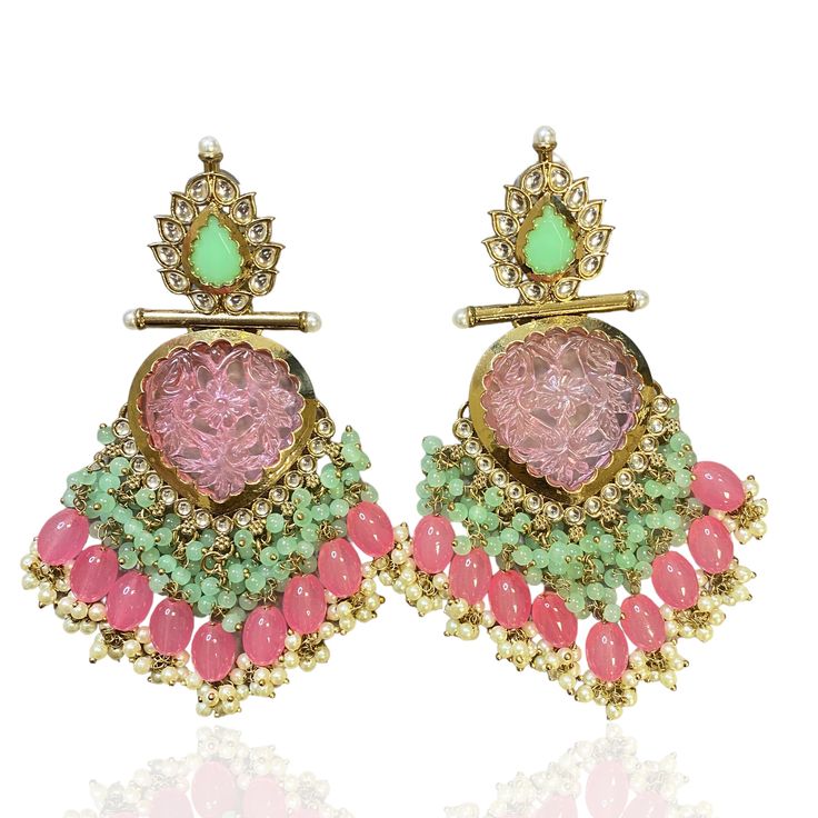 Indian jewellery online with mint pink gold plated earrings with pearls on gold plating. Festive Fusion Chandelier Drop Earrings, Fusion Style Dangle Earrings For Festive Occasions, Fusion Style Earrings With Intricate Design For Celebration, Elegant Earrings With Latkans For Celebration, Fusion Style Bridal Drop Earrings With Latkans, Elegant Jeweled Earrings For Reception, Fusion Style Chandelier Drop Earrings With Intricate Design, Traditional Pink Earrings For Formal Occasions, Festive Fusion Dangle Earrings