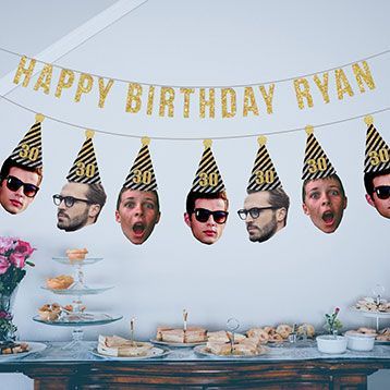 an image of a birthday party with people wearing hats and eating food on the table