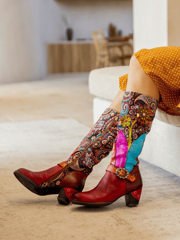 Tread the streets in style with Soffia's Brycen Abstract Swirl Print Floral Applique Leather Boots! Crafted from durable leather with an irresistible abstract swirl print design, these boots offer personalized style that is sure to turn heads. Step up your shoe game and strut with joy in these on-trend boots! 1.77'' heel 14.4" Shaft 16.8" Circumference Zip closure Leather upper Leather & Cotton lining Leather footbed Leather midsole Leather insole Rubber sole