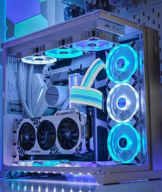 the inside of a computer case with blue lights and fanless parts on it's sides