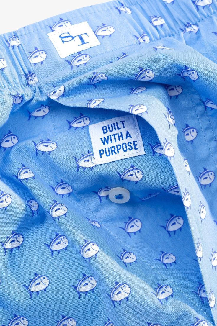 Soft cotton. Comfortable fit. This classic boxer short is all about the Skipjack – shown in the fabric, on the front label, and on the laser engraved button. We finish it off with a playful catchphrase sewn into the button fly. Style: 4100 Blue Button-up Cotton Shorts, Blue Cotton Button-up Shorts, Blue Cotton Shorts With Buttons, Blue Cotton Shorts With Button Closure, Father Son Outfits, Beach Towel Bag, Preppy Clothes, Mens Boxer Shorts, Boys Swim Trunks