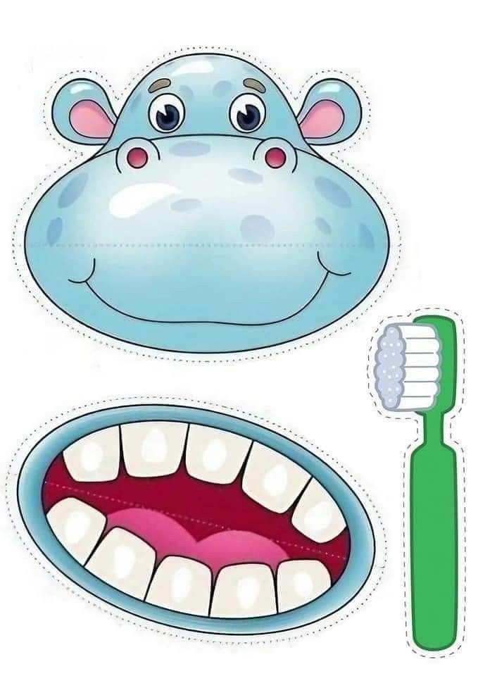 a cartoon hippo face next to a toothbrush