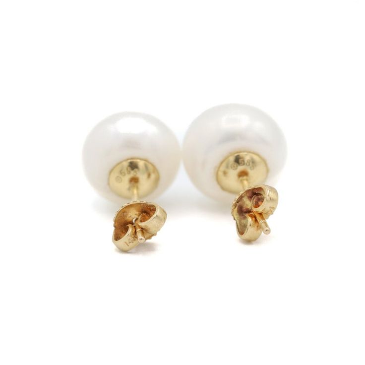 Feel special with this breathless pearls stud earrings. Delightfully polished with 14K yellow gold, it is guaranteed to add a touch of luxury to any outfit. With 2 beautiful white pearls, this stunning stud earrings will elevate your beauty.  Beautifully adorned with 2 white pearls, this jewelry emits an undeniable elegance like no other. Perfectly splendid to wear on any occasion, adding a touch of class to casual or formal outfits!  Specifications - Metal: 14K Yellow Gold - Weight: 5.1 g - Size: 0.5 inch  Stone Details - Type: Pearls - Quantity: 2 - Shape: Round. - Color: White Formal White Pear-shaped Pearl Earrings, White Pear-shaped Pearl Earrings For Formal Occasions, Formal White Akoya Pearl Earrings, Classic White Pear-shaped Earrings, White Pear-shaped Pearl Pendant Earrings, White Akoya Pearl Earrings, White Pear-shaped Pearl Earrings With Pendant, Classic White Akoya Pearl Earrings, White Akoya Pearl Earrings With Pearl Charm