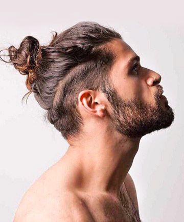 Love it or hate it, you couldn't avoid the man bun this year. And looking at these pictures of hot dudes, why would you want to? Mens Long Hairstyles Shaved Sides, Mens Long Hair With Shaved Sides, Mens Long Undercut Hairstyles, Men Long Hair Shaved Sides, Long Hair Shaved Sides Men, Man Bun Haircut, Long Hair Shaved Sides, Man Bun Undercut, Man Bun Styles