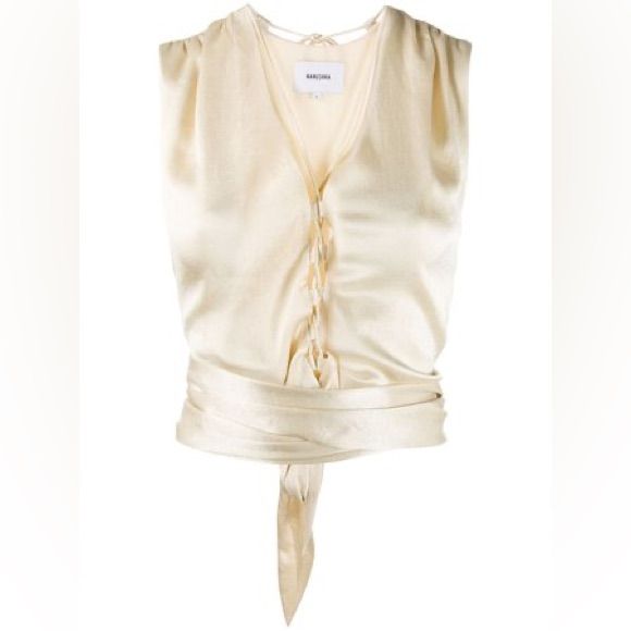 Nanushka Ivory Cream Satin Cross Tie V-Neck Crop Top Size: L Condition: New With Tags Questions? Leave A Comment Below! Beige Silk V-neck Top, Cream V-neck Silk Blouse, Silk V-neck Blouse In Cream, Cream Silk V-neck Blouse, Beige V-neck Top For Wedding, Cream Silk V-neck Top, Silk V-neck Wedding Top, Designer Tops For Women, Strapless Crop Top