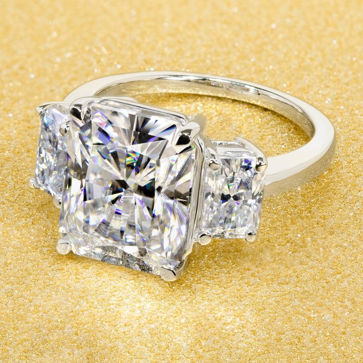 14K Gold 5ct Radiant-cut Moissanite Three-Stone Engagement Ring | Earthena Jewelry 25 Anniversary Rings, Bold Engagement Rings, Engagement Ring 3 Stone, Ring 3 Stone, Gold Moissanite Ring, Radiant Ring, Prong Ring, Bridal Engagement Rings, Three Stone Engagement