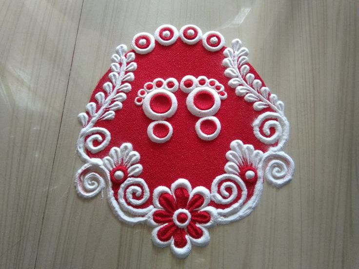 Siddhis rangoli art Rangoli Designs For Lakshmi Puja, Red Rangoli, Simple Rangoli Designs For Beginners, Tulsi Puja, Deepawali Rangoli, Attractive Rangoli Designs, Christmas Rangoli, Easy And Simple Rangoli Designs, Rangoli Designs For Beginners