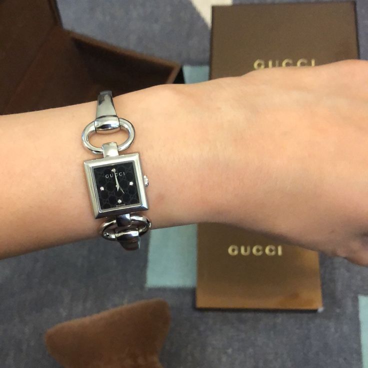 Authentic Gucci Watch Gucci Timeless Watch With Rectangular Dial, Gucci Timeless Rectangular Dial Watch, Gucci Formal Watch With Rectangular Dial, Modern Gucci Jewelry With Round Dial, Gucci Watches With Metal Dial, Elegant Gucci Watch With Rectangular Dial, Luxury Gucci Jewelry With Metal Dial, Timeless Gucci Evening Watch, Designer Gucci Watch For Evening