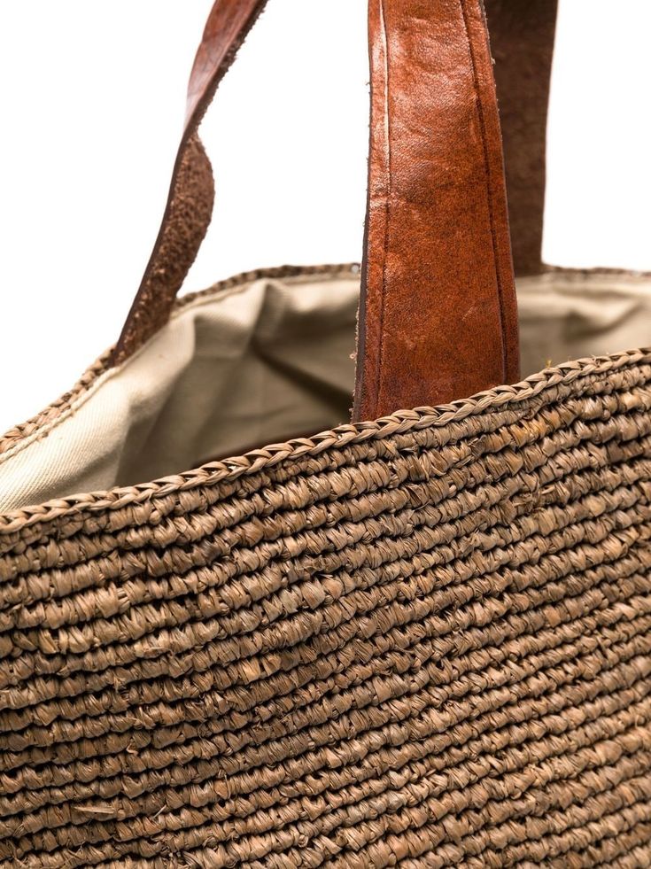 Tan straw woven basket tote from IBELIV featuring leather trims, top handles, an open top design and a canvas lining. This item is in size UNI and the color is Leather Weave, Brown Tote Bag, Basket Tote, Brown Tote, Woven Basket, Leather Weaving, Top Design, Open Top, The List