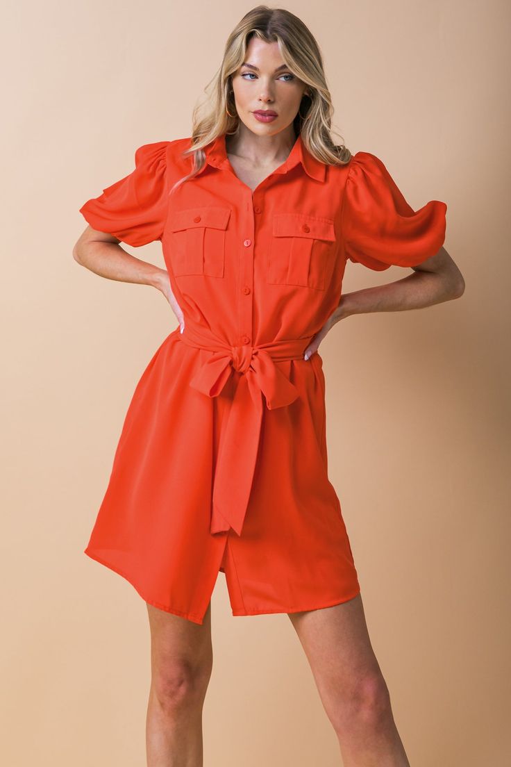 Achieve a sophisticated yet effortless look with the WISHFUL THINKING WOVEN SHIRT DRESS. This collared, short puff-sleeved design is detailed with button placket and two pockets for convenience. The self-sash tie provides an adjustable fit for a look that is tailored to your style. Details Self: 100% Polyester Lining: 100% Polyester Size & Fit - Model is 5`8 " And Wearing Size Small - Measurements Taken From Size Small - Approx. Length: 36.5” Chic Puff Sleeve Shirt Dress For Work, Summer Workwear Knee-length Puff Sleeve Dress, Chic Solid Color Short Sleeve Shirt Dress, Chic Short Sleeve Shirt Dress, Spring Belted Short Sleeve Dress, Spring Workwear Short Sleeve Mini Dress, Spring Mini Length Short Sleeve Work Dress, Spring Mini Length Short Sleeve Dress For Work, Spring Short Sleeve Shirt Dress For Work