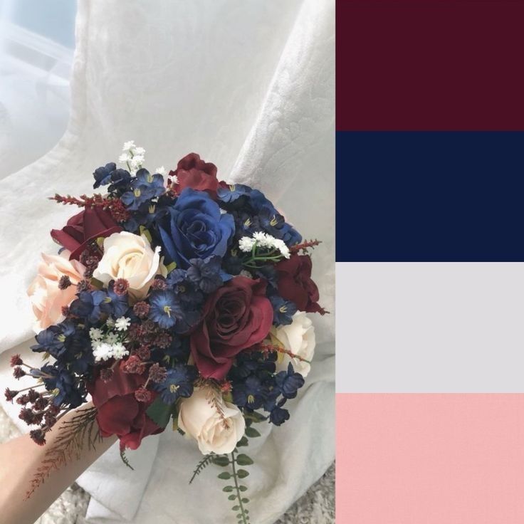 a bride's bouquet with red, white and blue flowers on her wedding day