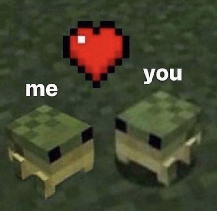 two cubes with the words me and you on them in front of a red heart