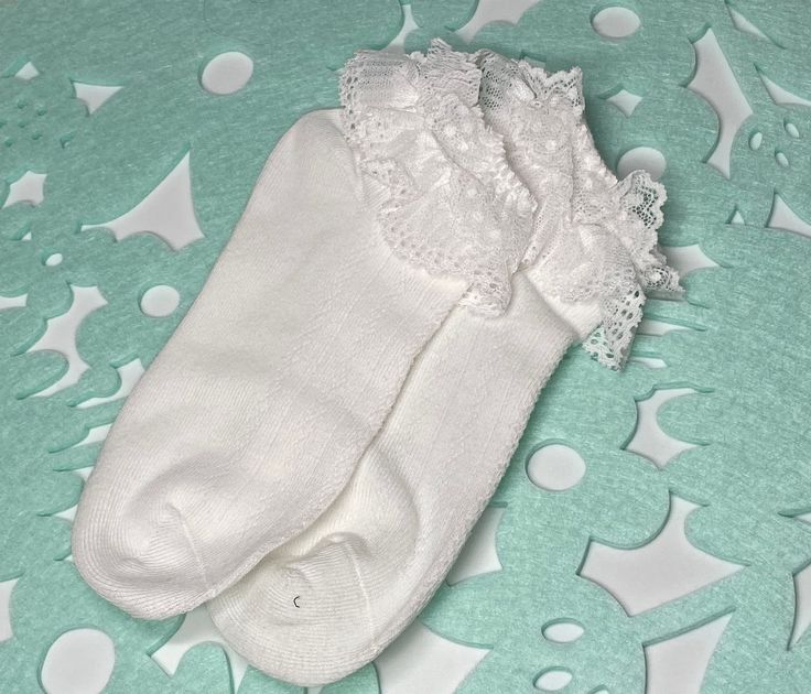 ♥ Girl's Soft White Lace Ankle Ruffled Socks. ♥ Perfect for ANY special occasion such as a wedding, First Communions, or just simply for everyday wear! They have a gorgeous double lace detail! ♥ 80% Combed Cotton, 17% Nylon, 3% Spandex ♥ Available Sizes: L, XL and XXL(as Shown) ♥ We offer a USPS Priority Mail shipping upgrade in our listings. Just add it to your cart if you need your order rush. Here is the link: https://www.etsy.com/your/shops/AmeliaSA22/tools/listings/section:29885881,stats:tr Fitted Ruffle Socks For Spring, Spring Ruffled Fitted Socks, Spring Ruffled Socks, Stretch White Socks With Ruffles, White Stretch Socks With Ruffles, Fitted White Ruffled Socks, White Lace Socks, Girl White Socks, Socks Ruffle