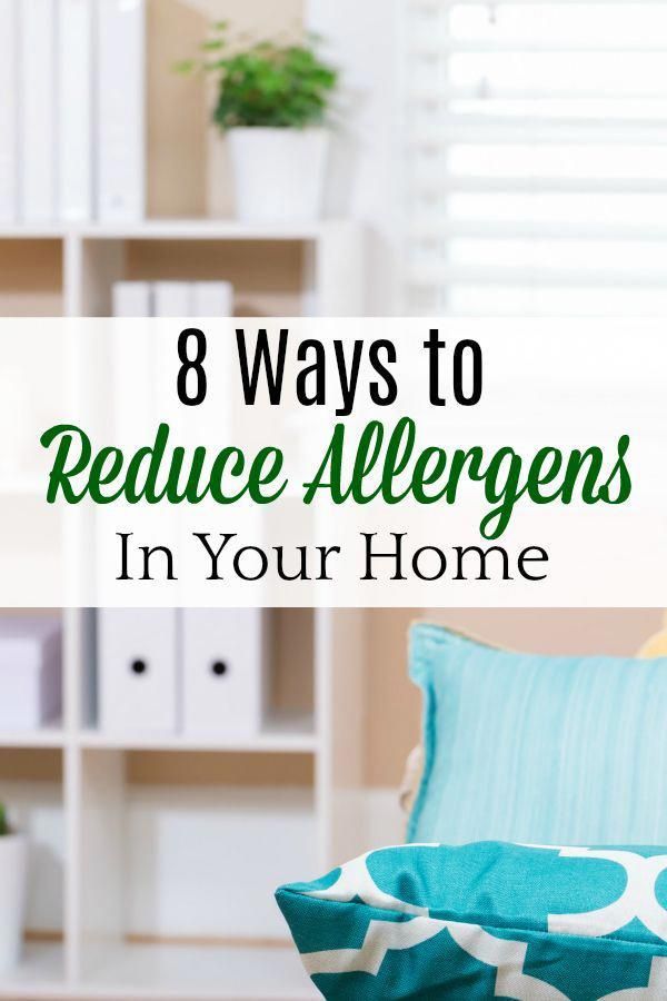 a couch with pillows and the words 8 ways to reduce allergens in your home