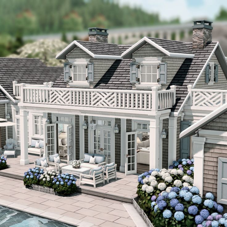 a rendering of a house with blue flowers in the front yard and landscaping around it