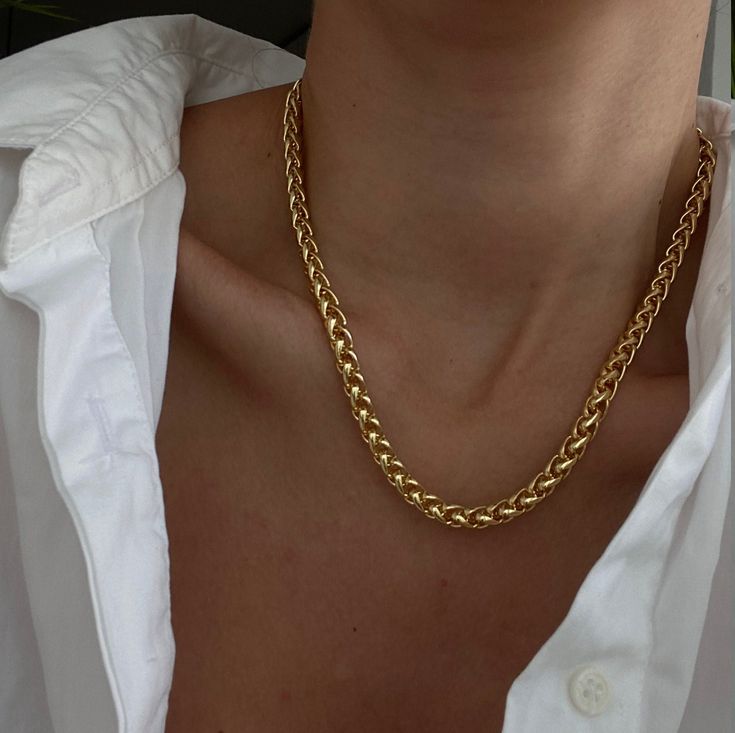 "Our ultimate Gold Wheat Link Necklace is a piece that will most definitely be your go to necklace, day to night, achieving that effortlessly chic look. Perfect to be worn alone or combine with other. Materials & Measurements: 14k Gold plated brass Length- 17.7\" / 45cm Width 6mm *Also available in silver here: https://www.etsy.com/il-en/listing/1073030857/silver-plated-spiga-chain-necklace?ref=shop_home_active_4 *Also available in Thicker version here: https://www.etsy.com/il-en/listing/107 Modern Wheat Chain Jewelry As A Gift, Classic Wheat Chain Necklace As Gift, Classic Wheat Chain Necklace For Gift, Minimalist Wheat Chain Necklace For Gift, Minimalist Yellow Gold Wheat Chain Necklace, Modern Necklaces With Wheat Chain As Gift, Modern Wheat Chain Necklaces As Gift, Modern Wheat Chain Necklace As A Gift, Modern Wheat Chain Necklace As Gift