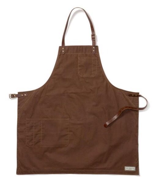 a brown apron with two straps on it