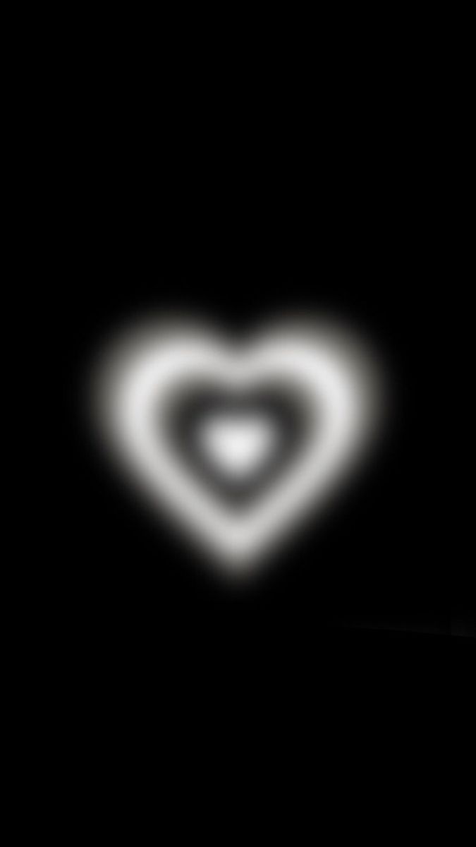 a heart shaped object in the dark