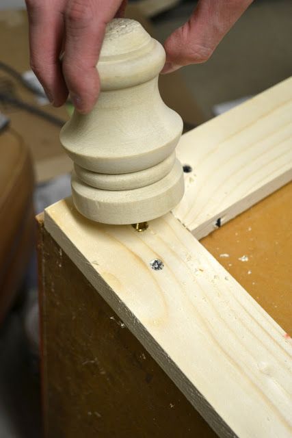 a person working on a piece of wood