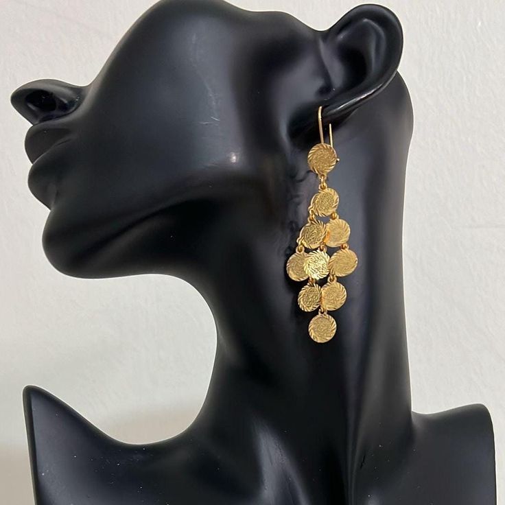 Hi there! A fine set of earrings from the Arabian heritage. 24K gold plated with coins. Wear it to your photoshoot, henna party, or as a wedding guest. Or on Eid! This piece falls under the category of gold imitation. It has the same design as real gold pieces sold in the Middle East. Enjoy it! Since this piece is gold plated, please wear it gently as its color should last you much more than any other piece of jewelry. Please avoid washing or scratching the plating away, and keep out of contact Gold Metal Bridal Earrings For Celebration, Gold Bridal Earrings For Celebration, Traditional Festive Plated Earrings, Festive Gold Single Earring, Festive Single Gold Earring, Gold Latkan Earrings For Party, Gold Plated Earrings For Festive Occasions, Gold Metal Bridal Earrings With Latkans, Gold-plated Temple Jewelry Earrings