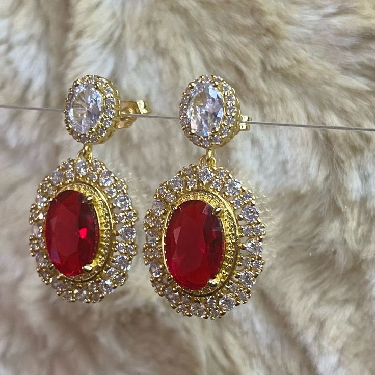 Beautiful Gold Plated Earrings With Cubic Zirconia Red And White Stones. 3/4” Width 1” Length Red Drop Bridal Earrings For Formal Occasions, Red Drop Bridal Earrings As Gift, Red Cubic Zirconia Bridal Earrings For Party, Red Drop Earrings For Bridal Gift, Formal Red Cubic Zirconia Earrings, Red Dangle Bridal Earrings, Red Dangle Earrings For Anniversary, Red Round Bridal Earrings For Anniversary, Formal Red Round Bridal Earrings