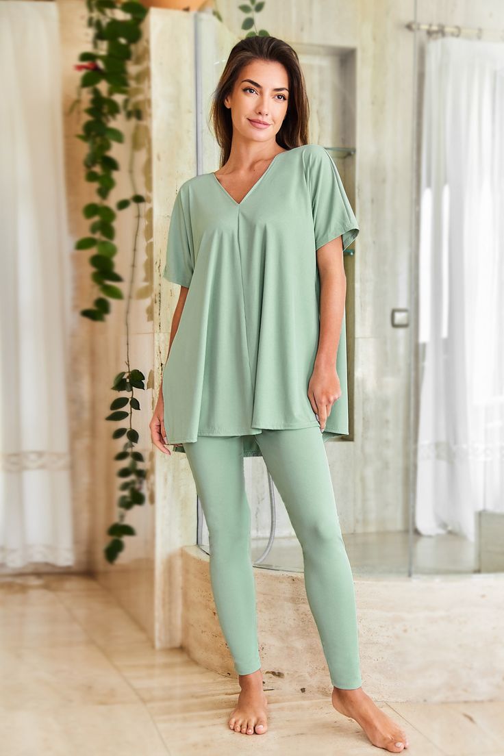 From sunrise to sunset, the Mint Jersey Top & Leggings Pajama Set is your everyday essential. Perfect for lazy mornings or movie nights in, these pajamas are as comfy as they are cute. Product code: CAA10A4D017PP Features:  V-neckline Short sleeves Material: 65%POLYESTER,35%COTTON. Green Stretch Sleepwear For Loungewear, Comfortable Leggings For Loungewear, Comfortable Relaxed Fit Leggings For Loungewear, Comfy Stretch Sleepwear For Spring, Green Athleisure Leggings For Loungewear, Spring V-neck Activewear For Loungewear, Comfortable Athleisure Leggings For Loungewear, Solid Color Leggings For Summer Loungewear, Green Spring Leggings For Loungewear