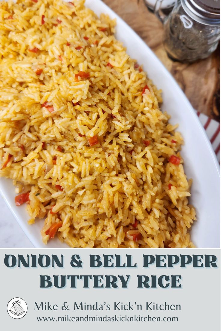 onion and bell pepper buttery rice on a white plate