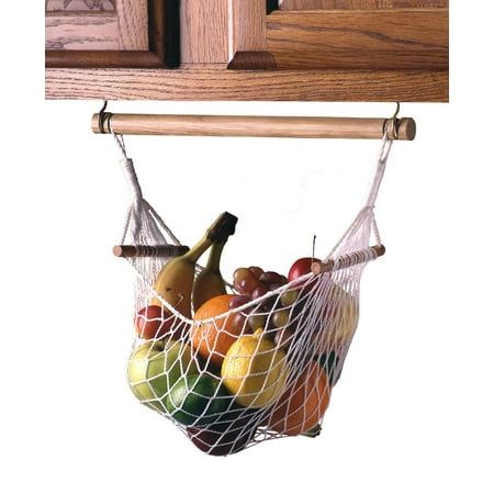 a fruit basket hanging from the side of a cabinet