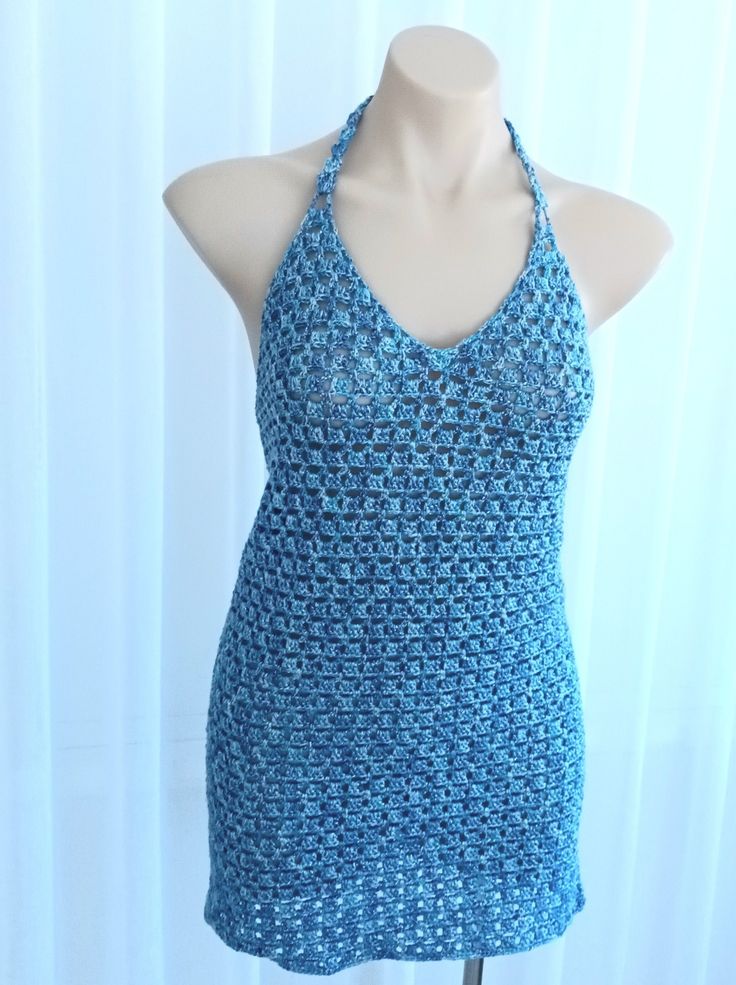 READY TO SHIP NOW Blue sparkly lacy crochet body con dress, cocktail dress, festival dress, party dress.  Please make sure to check your own measurements against the model's measurements before buying. This dress will fit size  8 to 10 in Australian sizes. ( stretches up to 2cm) depending on how tight you like to wear your dresses. FIND MORE DRESSES HERE: https://www.etsy.com/your/shops/me/tools/listings/section:41165872,sort:title,order:ascending,stats:true MODEL'S MEASUREMENTS:   Bust- 87cm. U Elegant Stretch Crochet Dress For Beach, Bohemian Sleeveless Crochet Dress For Party, Bohemian Stretch Mini Dress For Party, Stretch Halter Neck Backless Dress For Beach, Summer Stretch Backless Dress For Beach, Beach Stretch Halter Neck Backless Dress, Stretch Crochet Dress For Beach Party, Fitted Mini Crochet Dress For Beach Cover-up, Stretch Crochet Dress For Beach Season Parties