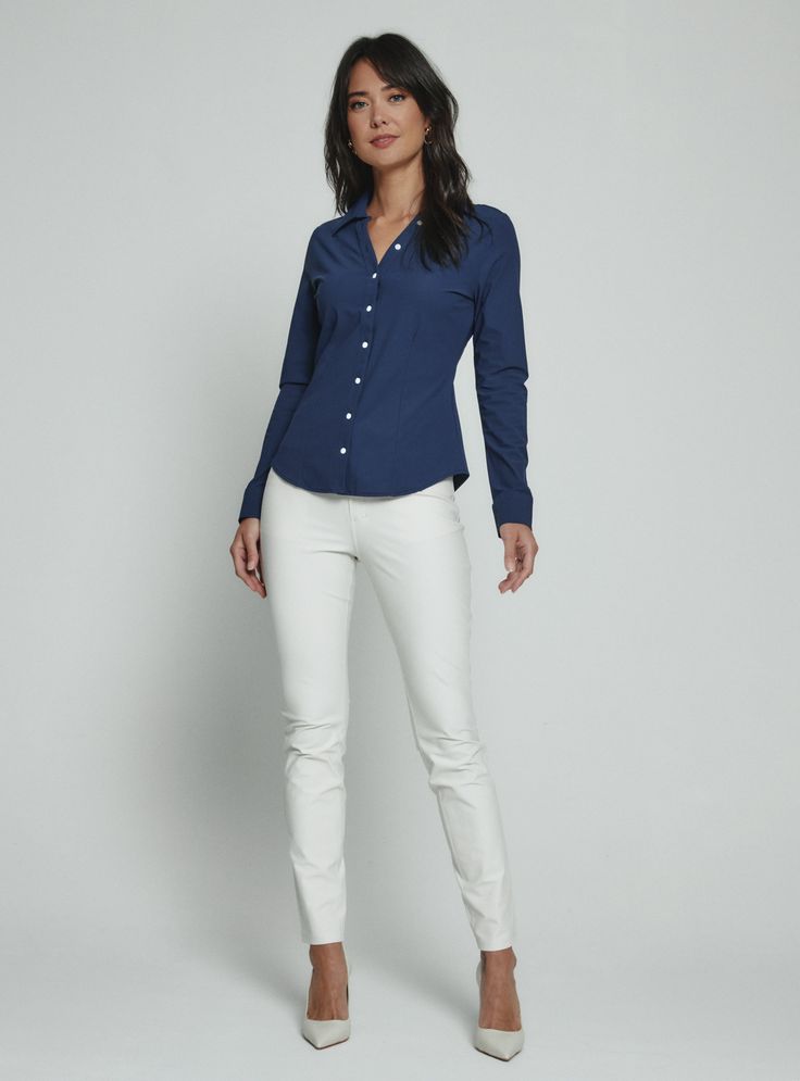 The Luxe Blouse features 4-Way Stretch fabrication that is both moisture-wicking and wrinkle free. This is a flattering semi-fitted blouse designed with mother of pearl buttons for a sophisticated look. Perfect for the office or a fancy dinner on the weekend. Details Model is 5'10" and wears a size small. Care: Machine wash cold on delicate cycle with similar colors. Do not bleach. Dry flat. Do not dry clean. Cold hand wash for best results. Composition: 78% Nylon | 22% Spandex Blouse Designed, Fitted Blouse, Fancy Dinner, Mother Of Pearl Buttons, Pearl Buttons, Clothing Ideas, Wrinkle Free, Lifestyle Brands, The Weekend