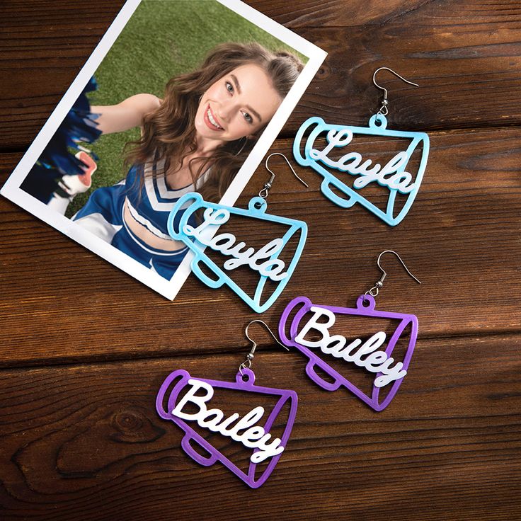 Custom Cheer Megaphone Earrings - These earrings can be customized with your name or the name of your choice, adding a personal and unique touch to your jewelry collection. It allows you to show off your cheerleading spirit with a personalized accessory.3D Printed Earrings - The earrings are crafted using 3D printing technology, resulting in intricate and detailed designs. The 3D printing process allows for customization and ensures a high level of precision and quality in the final product.Team Birthday Best Friend, Cheer Megaphone, Wedding Cord, 3d Printed Earrings, Printed Earrings, Acrylic Ideas, Personalised Family Tree, Christmas Names, Photo Necklace