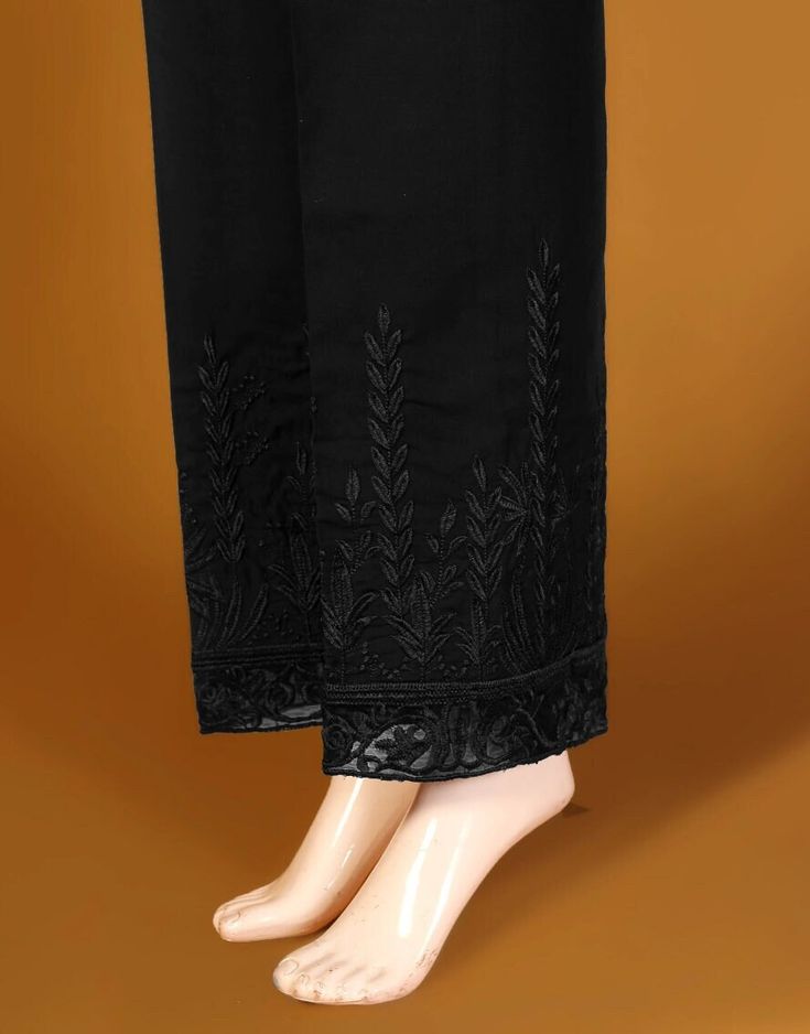 Description : Cotton Embroidered Trouser. Country of Origin : Pakistan Care Instruction : Should be washed in gentle cycle and hung to dry. Color may bleed so please be mindful of other items with it. Disclaimer : Size chart provides reference sizes and actual sizes might be slightly different from the size chart. Black Embroidered Cotton Bottoms, Non-stretch Embroidered Cotton Pants, Black Embroidered Cotton Pants, Summer Cotton Pants With Chikankari Embroidery, Summer Cotton Bottoms With Embroidered Border, Cotton Pants With Embroidered Border, Spring Cotton Pants With Resham Embroidery, Traditional Cotton Bottoms With Floral Embroidery, Traditional Black Bottoms For Spring