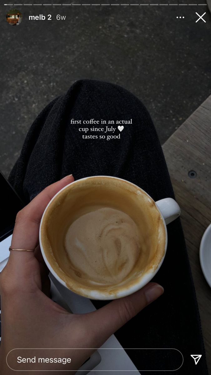 a person holding a cup of coffee in their hand with a quote on the side