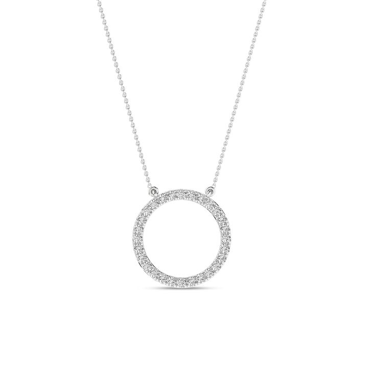 The Circular Silhouette Necklace is a testament to timeless style. It has a diamond-studded circular pendant that captures the essence of enduring love. This piece transforms any ensemble into a captivating look. It’s more than just a necklace; it’s a circle of endless possibilities. Classic White Gold Open Circle Necklace, White Gold Diamond Necklace With Round Pendant, Timeless Round Necklace For Wedding, Elegant Halo Open Circle Necklace, Timeless Round Wedding Necklaces, Classic Full Circle Formal Jewelry, Diamond Circle Halo Jewelry, Classic Round Diamond Necklace With Halo Design, White Gold Pave Setting Round Pendant Necklace