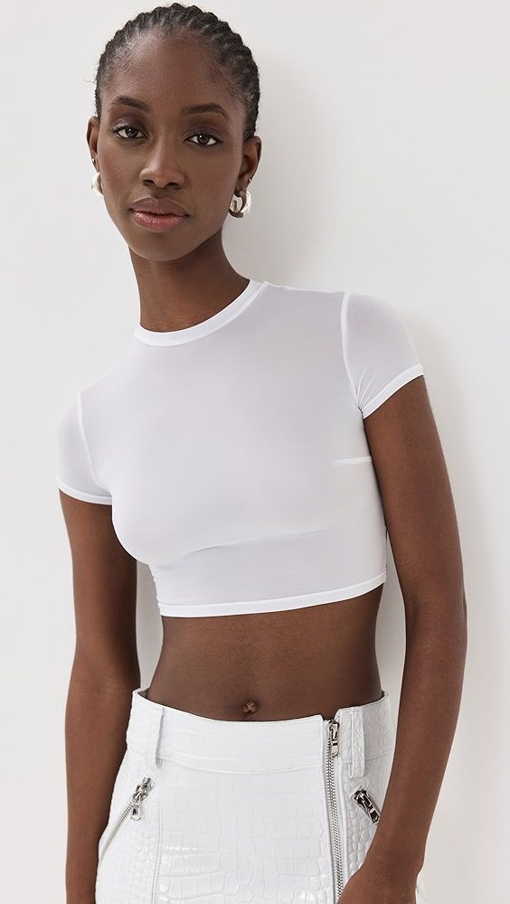 Laquan Smith Crop Top | Shopbop White Fitted T-shirt With Cap Sleeves, White Fitted Tops With Cap Sleeve, Sheer Short Sleeve T-shirt, High Stretch Seamless Crop Top With Short Sleeves, Solid Stretch Short Sleeve Crop Top, Fitted Short Sleeve Sheer T-shirt, Solid High-stretch Crop Top With Short Sleeves, Sporty Short Sleeve Elastane T-shirt, Stretch Elastane Crop Top With Short Sleeves