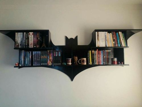 the batman book shelf is filled with books