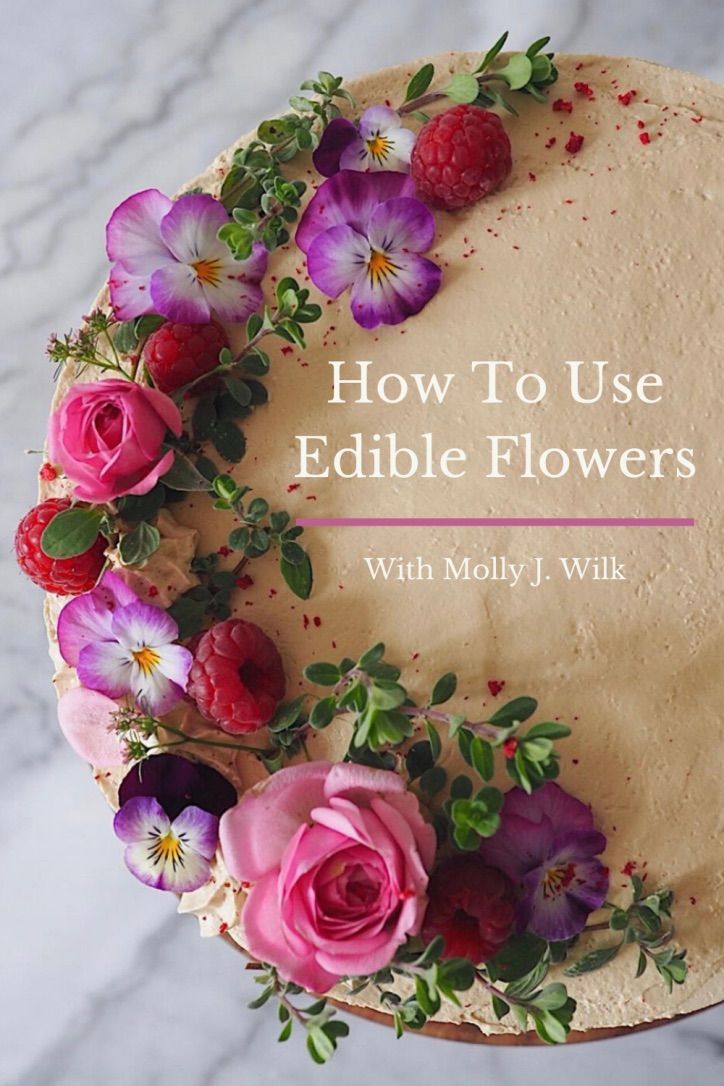 a cake with flowers on it and the words how to use edible flowers