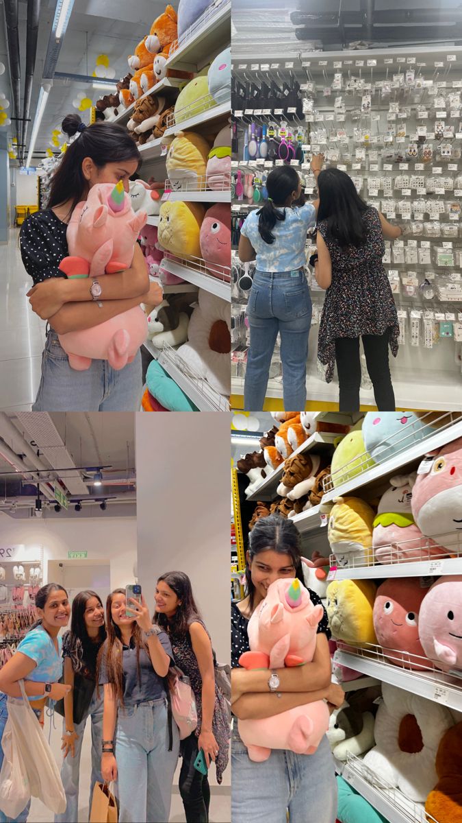 two girls are holding stuffed animals in a store