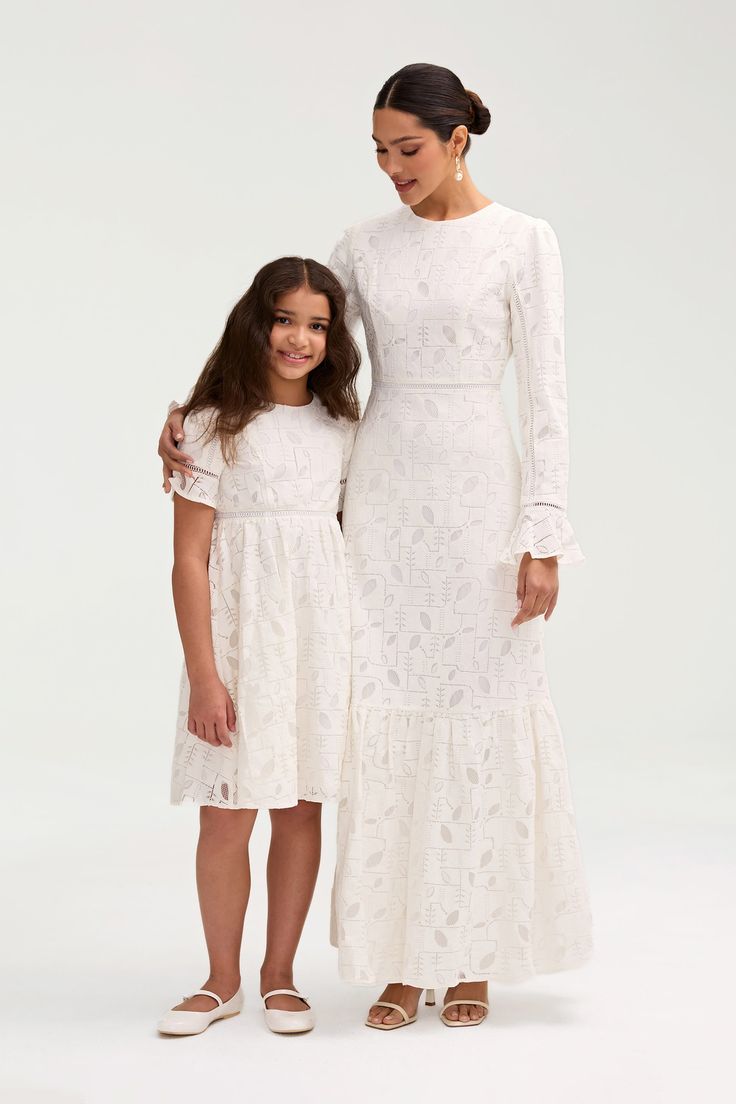 Embrace elegance with our Rayaa White Lace Dress, crafted with delicate lace and designed to match mommy's style. Make a statement at any special occasion with this exclusive piece. Model is 8 years old and 54 in. tall wearing size 8Y-9Y. White Dress Formal, Dresses Flowy, Nikkah Dress, Modest Dress, Mommy Style, White Lace Dress, Engagement Dresses, Basic Dress, Ribbed Dresses