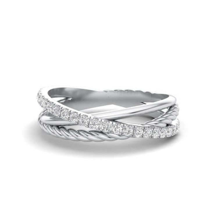 The truth is you'll be falling head over heels for this flirty diamond ring. Dive into this 14k white gold ring that holds so much personality, with its 3-row band, a braided rope detail, a smooth polished finish, and you can't forget the brilliant round diamond band coming down the middle. This stunning and versatile ring is the perfect option for when you went to feel flirty and feminine. 14k White Gold Round Diamonds 0.19ctw Diamonds Braided Rope Size 6 Special Order Sizes Available Silver Rings Handmade Twist, Luxury White Gold Jewelry With A Modern Twist, Gold Twist Band Diamond Ring, Luxury Modern Twist Bypass Ring For Formal Occasions, Luxury Rings With A Modern Twist In White, Luxury Modern Twist Bypass Ring For Wedding, Luxury Modern Twist Diamond Promise Ring, Luxury Single Diamond Jewelry With A Modern Twist, Luxury Round Cut Jewelry With A Modern Twist