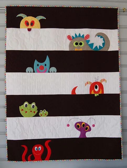 a wall hanging made to look like it has monsters on it