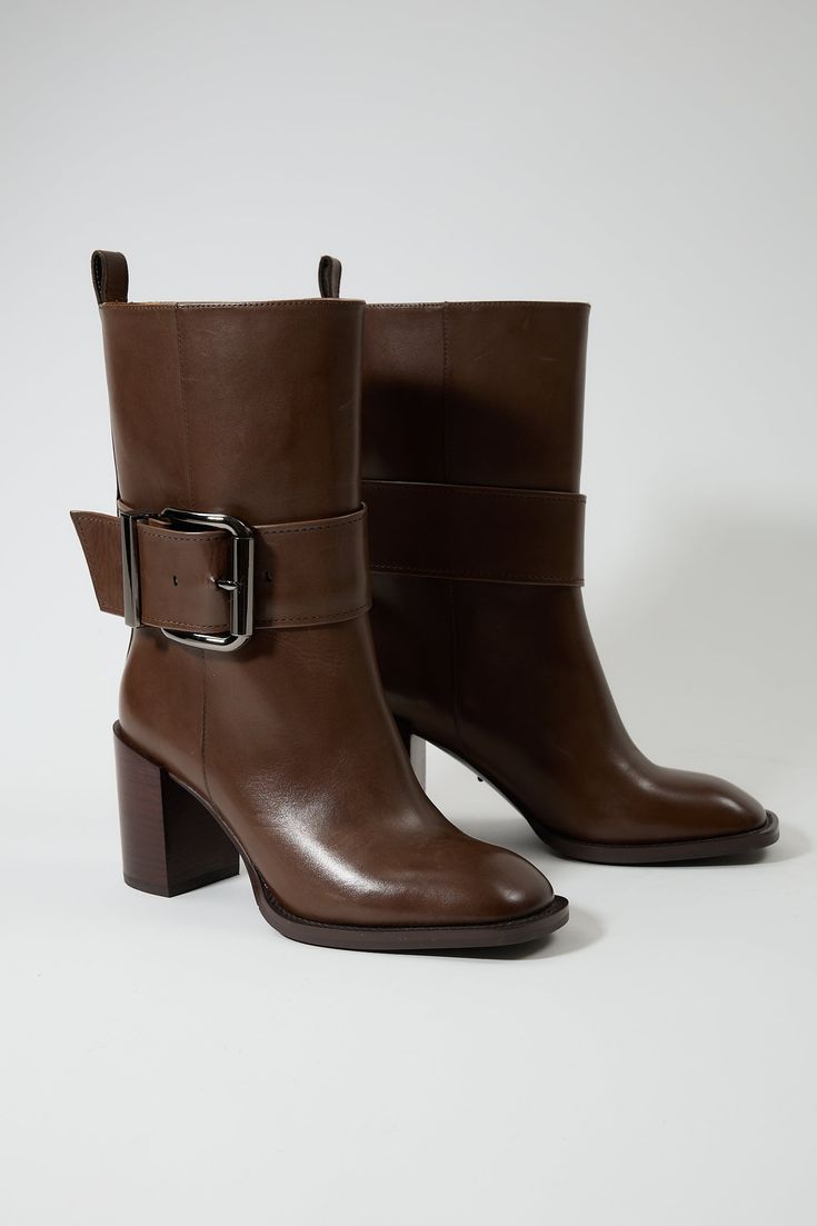 Heel height - 3.1in Calf Width - 8.1in Genuine Leather Lining - Calf Leather Elevate your footwear collection with the Evanthe Women's Boots, where contemporary elegance meets robust functionality. Designed for the modern woman who values both style and practicality, these boots are the epitome of sophistication and comfort. Fall Workwear Heels With Buckle Closure, Spring Heeled Boots With Buckle For Workwear, Modern Winter Office Heels, Brown Office Boots With Buckle Closure, Spring Workwear Heeled Boots With Buckle Closure, Modern Office Heels For Winter, Brown Heeled Boots With Buckle Closure, Fall Heeled Boots With Buckle Closure For Office, Brown Business Boots With Buckle Closure