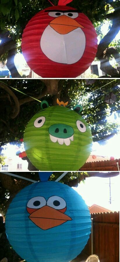 three paper lanterns with angry birds on them