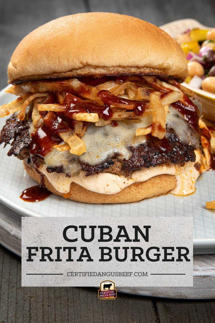 a close up of a burger on a plate