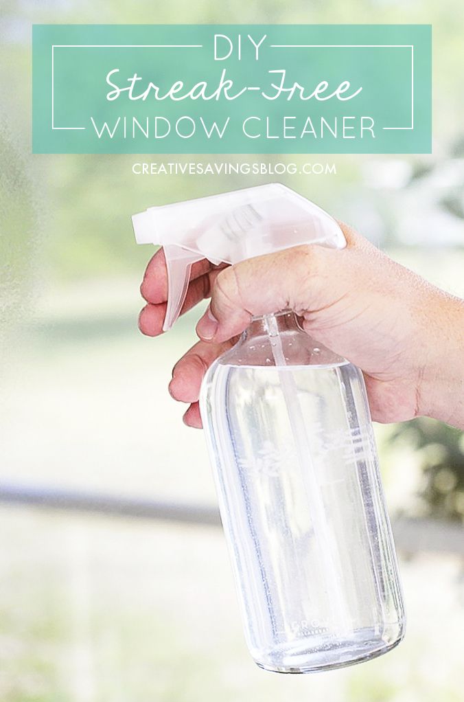 a hand holding a bottle with a window cleaner in it and the words diy streak - free window cleaner above it