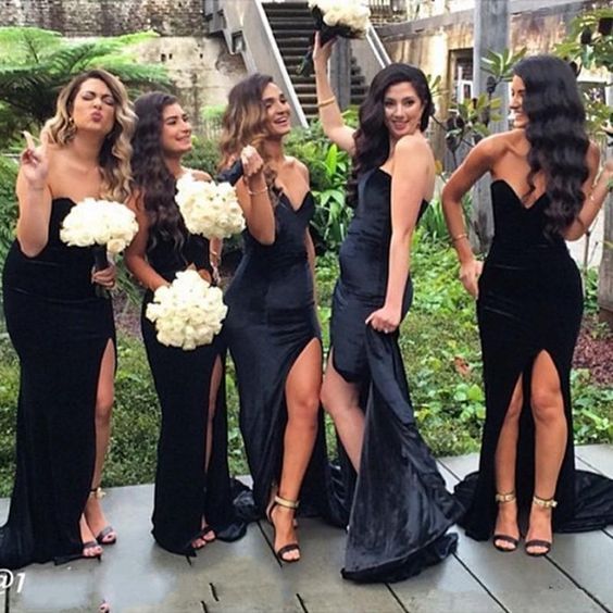 the bridesmaids are all dressed in black dresses