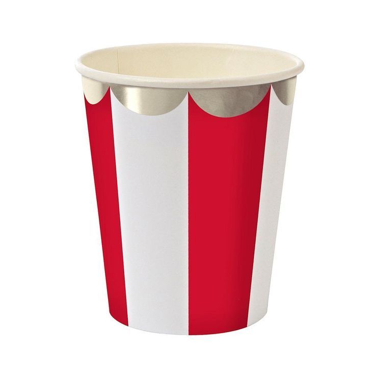 a red and white striped paper cup on a white background