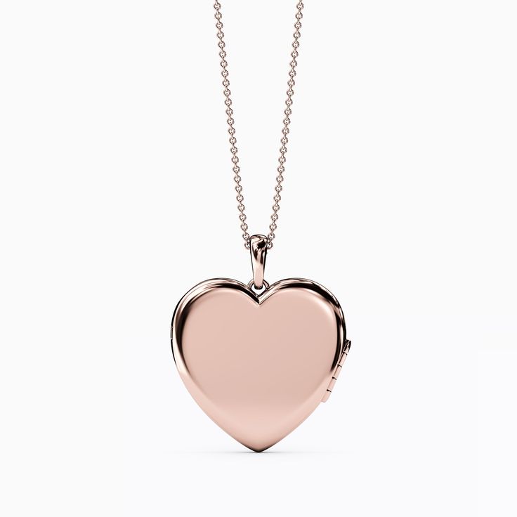 Hearts, precious metals, and diamonds that will never lose their shine serve as a symbol of our most humble and eternal gratitude. Engraved Rose Gold Necklaces In Fine Jewelry Style, Engraved Rose Gold Fine Jewelry Necklaces, Engraved Rose Gold Necklaces Fine Jewelry, Engraved Rose Gold Fine Jewelry Necklace, Elegant Rose Gold Medallion Jewelry, Elegant Heart Charm Locket Necklace, Keepsake Diamond Pendant Jewelry, Diamond Pendant Jewelry For Keepsake, Rose Gold Locket For Valentine's Day